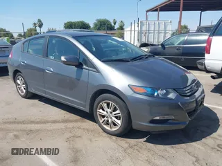 2010 Honda Insight EX with VIN JHMZE2H72AS015870, listed as a IAAI auction lot 42762384 with 58,121 mi miles and . Bid and sale history available at DreamBid. Image 1.
