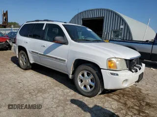 2005 GMC Envoy SLT with VIN 1GKDT13S852185958, listed as a Copart auction lot 68736194 with 225,398 mi miles and Salvage Title. Bid and sale history available at DreamBid. Image 4.