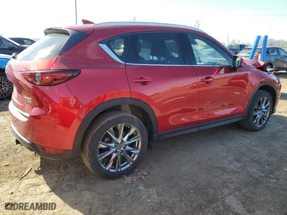 2021 Mazda CX-5 Signature with VIN JM3KFBEYXM0434778, listed as a Copart auction lot 51980255 with 34,283 mi miles and Salvage Title. Bid and sale history available at carsss.com. Image 3.