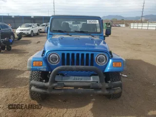 2003 Jeep Wrangler Sport z VIN 1J4FA49S53P350281, wystawiony jako Copart lot #56634005 z przebiegiem 158 974 mil mil oraz Szkoda całkowita • Salvage title. Historia ofert i sprzedaży dostępna na DreamBid. Obrazek 5.