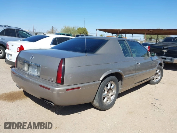 2001 Cadillac Eldorado Touring ETC z VIN 1G6ET12971B109319, wystawiony jako IAAI lot #41682779 z przebiegiem 147 515 mil mil oraz . Historia ofert i sprzedaży dostępna na DreamBid. Obrazek 4.