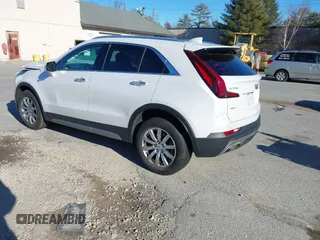 2022 Cadillac XT4 AWD Premium Luxury with VIN 1GYFZDR41NF105299, listed as a IAAI auction lot 41257154 with 34,904 mi miles and . Bid and sale history available at carsss.com. Image 3.