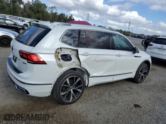2023 Volkswagen Tiguan SEL R-Line z VIN 3VV4B7AX8PM040917, wystawiony jako Copart lot #84402084 z przebiegiem 6 905 mil mil oraz Szkoda całkowita • Salvage title. Historia ofert i sprzedaży dostępna na DreamBid. Obrazek 3.