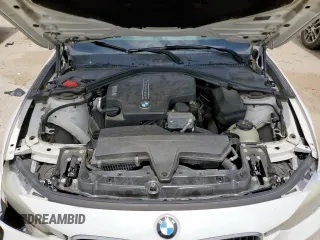 2014 BMW 3 Series 320i z VIN WBA3B1C57EP679989, wystawiony jako Copart lot #56383665 z przebiegiem 125 617 mil mil oraz Szkoda całkowita • Salvage title. Historia ofert i sprzedaży dostępna na DreamBid. Obrazek 11.