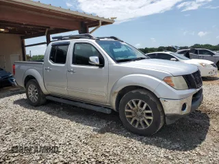 2011 Nissan Frontier SL with VIN 1N6AD0ER3BC449851, listed as a Copart auction lot 61001375 with 254,759 mi miles and Salvage title. Bid and sale history available at DreamBid. Image 4.