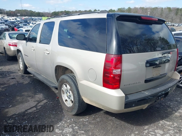 2007 Chevrolet Suburban LS with VIN 1GNFC16047J252702, listed as a IAAI auction lot 41576927 with 401,122 mi miles and . Bid and sale history available at DreamBid. Image 3.