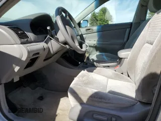 2002 Toyota Camry LE z VIN 4T1BE32K02U084676, wystawiony jako Copart lot #49712395 z przebiegiem 74 049 mil mil oraz Czysty tytuł • Clean title. Historia ofert i sprzedaży dostępna na DreamBid. Obrazek 7.