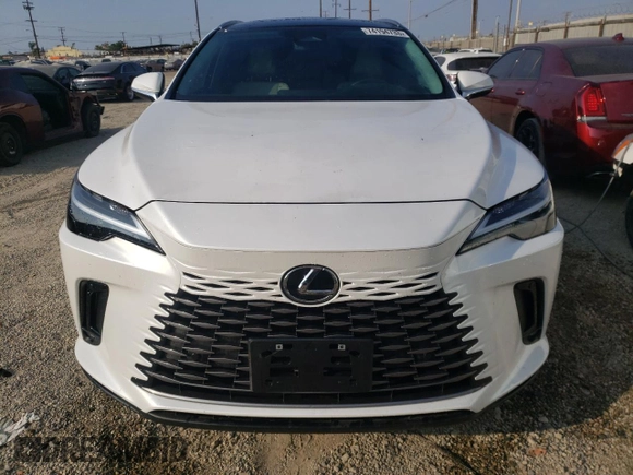 2023 Lexus RX with VIN 2T2BBMCA4PC002053, listed as a Copart auction lot 74194733 with 5,972 mi miles. Bid and sale history available at carsss.com. Image 5.