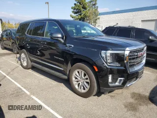 2021 GMC Yukon SLT with VIN 1GKS1BKD0MR395515, listed as a Copart auction lot 42810935 with 54,071 mi miles and Salvage Title. Bid and sale history available at carsss.com. Image 4.