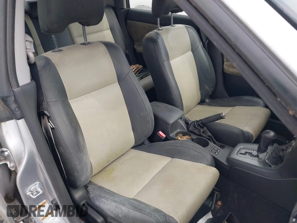 2005 Saab 9-2X Linear z VIN JF4GG61625H054501, wystawiony jako IAAI lot #41922881 z przebiegiem 140 723 mil mil oraz . Historia ofert i sprzedaży dostępna na DreamBid. Obrazek 8.