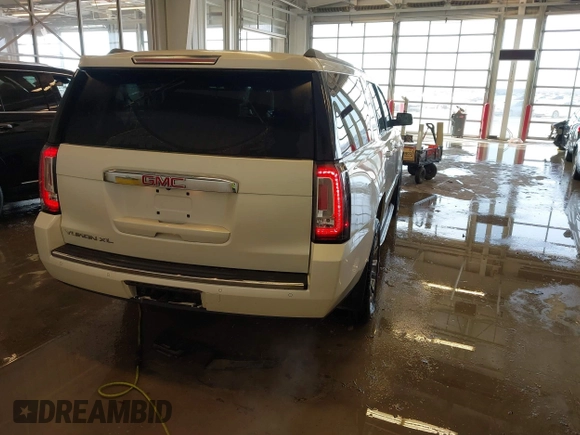 2015 GMC Yukon XL Denali with VIN 1GKS2JKJXFR528927, listed as a IAAI auction lot 41391259 with 159,467 mi miles. Bid and sale history available at carsss.com. Image 4.
