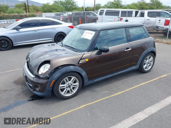 2012 MINI Hardtop with VIN WMWSU3C58CT261401, listed as a IAAI auction lot 42191548 with 96,115 mi miles and . Bid and sale history available at DreamBid. Image 2.