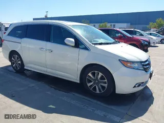 2015 Honda Odyssey Touring Elite with VIN 5FNRL5H91FB038099, listed as a IAAI auction lot 41829649 with 167,017 mi miles. Bid and sale history available at carsss.com. Image 1.