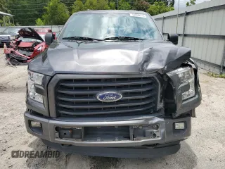 2015 Ford F-150 XLT with VIN 1FTEW1EG8FFC03207, listed as a Copart auction lot 59690515 with 261,153 mi miles and Salvage title. Bid and sale history available at DreamBid. Image 5.