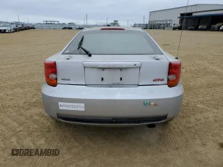 2000 Toyota Celica GTS with VIN JTDDY32T7Y0001953, listed as a Copart auction lot 87116164 with 230,036 mi miles and Salvage Title. Bid and sale history available at carsss.com. Image 6.