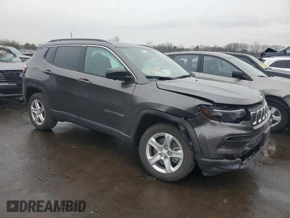 2023 Jeep Compass Latitude with VIN 3C4NJDBN4PT504602, listed as a Copart auction lot 46733985 with 10,223 mi miles and Salvage title. Bid and sale history available at DreamBid. Image 4.