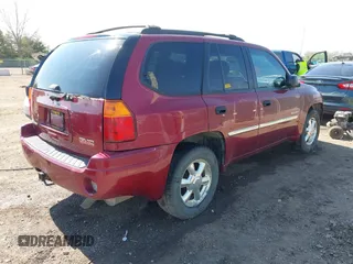 2006 GMC Envoy SLT with VIN 1GKDT13S662189377, listed as a IAAI auction lot 42106602 with 156,391 mi miles and . Bid and sale history available at DreamBid. Image 4.
