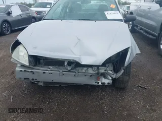 2007 Ford Focus S z VIN 1FAHP34N57W326220, wystawiony jako IAAI lot #42123072 z przebiegiem Nie podano mil oraz . Historia ofert i sprzedaży dostępna na DreamBid. Obrazek 6.