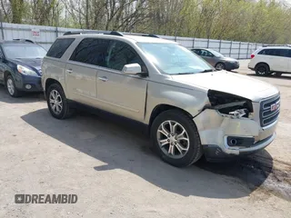 2015 GMC Acadia SLT z VIN 1GKKRSKD2FJ158888, wystawiony jako IAAI lot #42116752 z przebiegiem 156 778 mil mil oraz . Historia ofert i sprzedaży dostępna na DreamBid. Obrazek 1.