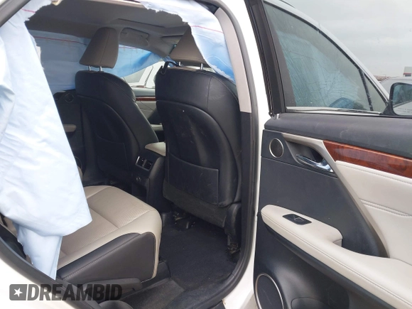 2018 Lexus RX 350L Premium z VIN JTJDZKCAXJ2010125, wystawiony jako IAAI lot #41899420 z przebiegiem 113 995 mil mil oraz . Historia ofert i sprzedaży dostępna na DreamBid. Obrazek 8.