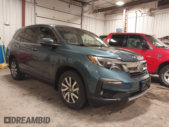 2019 Honda Pilot EX-L with VIN 5FNYF6H5XKB094879, listed as a IAAI auction lot 41265415 with 58,700 mi miles and . Bid and sale history available at DreamBid. Image 1.