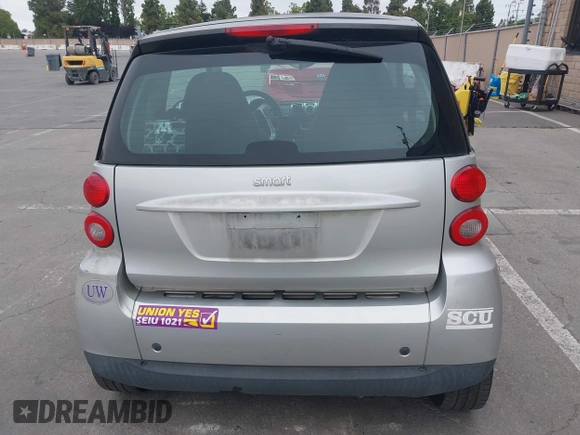 2009 Smart fortwo Pure z VIN WMEEJ31X99K209322, wystawiony jako IAAI lot #42465179 z przebiegiem 75 730 mil mil oraz . Historia ofert i sprzedaży dostępna na DreamBid. Obrazek 16.