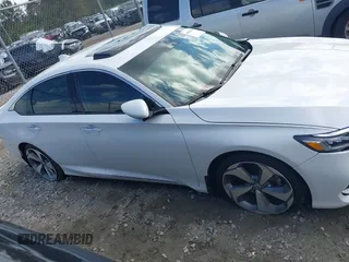2019 Honda Accord Touring with VIN 1HGCV2F96KA009252, listed as a IAAI auction lot 42003043 with 76,249 mi miles and . Bid and sale history available at DreamBid. Image 13.