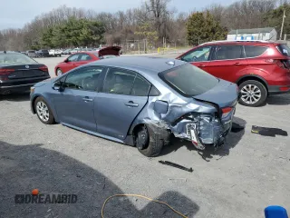 2023 Toyota Corolla Hybrid LE with VIN JTDBDMHE6PJ002943, listed as a Copart auction lot 49856805 with 20,700 mi miles and Salvage Title. Bid and sale history available at carsss.com. Image 2.