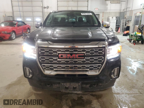 2022 GMC Canyon 4WD Denali with VIN 1GTG6EEN5N1112356, listed as a Copart auction lot 87871435 with 25,352 mi miles and Salvage Title. Bid and sale history available at carsss.com. Image 5.