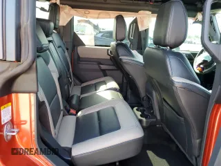 2024 Ford Bronco Wildtrak z VIN 1FMEE2BP4RLB23952, wystawiony jako Copart lot #57058835 z przebiegiem 12 180 mil mil oraz Nie do naprawy • Non repairable. Historia ofert i sprzedaży dostępna na DreamBid. Obrazek 11.