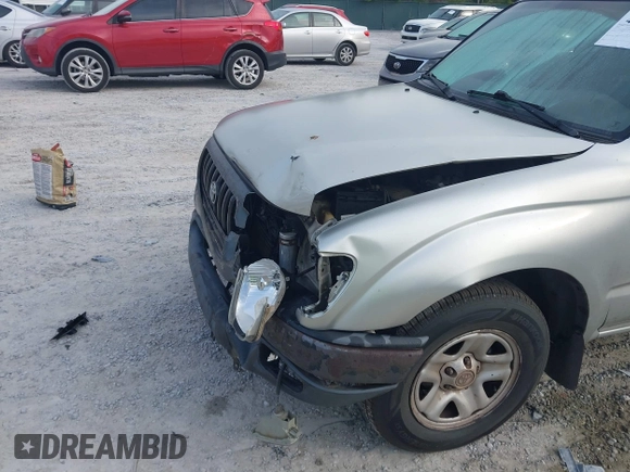 2003 Toyota Tacoma with VIN 5TENL42N63Z199086, listed as a IAAI auction lot 42084151 with 153,977 mi miles and . Bid and sale history available at DreamBid. Image 6.