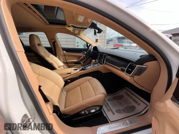 2013 Porsche Panamera z VIN WP0AA2A74DL016182, wystawiony jako Copart lot #89269425 z przebiegiem 119 089 mil mil oraz Czysty tytuł • Clean title. Historia ofert i sprzedaży dostępna na DreamBid. Obrazek 5.