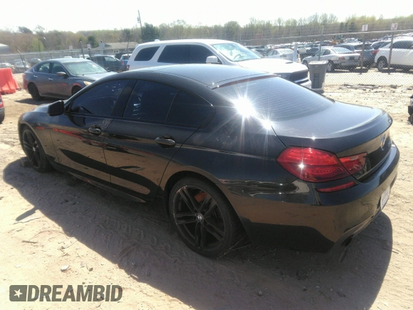 2014 BMW 6 Series 640i z VIN WBA6A0C57EDZ04682, wystawiony jako IAAI lot #41891362 z przebiegiem 140 478 mil mil oraz . Historia ofert i sprzedaży dostępna na DreamBid. Obrazek 3.