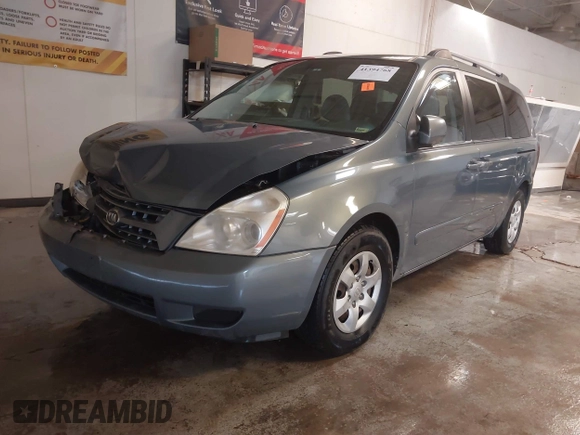 2009 Kia Sedona LX with VIN KNDMB233X96276905, listed as a IAAI auction lot 41394768 with 231,156 mi miles. Bid and sale history available at carsss.com. Image 18.