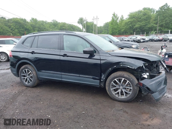 2021 Volkswagen Tiguan S z VIN 3VV0B7AX3MM031908, wystawiony jako IAAI lot #42504384 z przebiegiem 42 510 mil mil oraz . Historia ofert i sprzedaży dostępna na DreamBid. Obrazek 17.