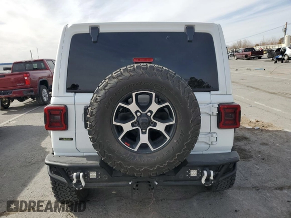 2021 Jeep Wrangler Unlimited Rubicon with VIN 1C4JJXFM6MW818162, listed as a Copart auction lot 42187885 with 34,273 mi miles and Salvage Title. Bid and sale history available at carsss.com. Image 6.