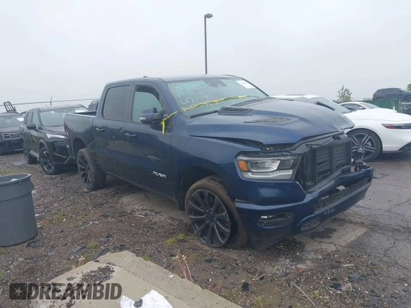 2023 Ram 1500 Laramie with VIN 1C6SRFJT9PN542437, listed as a IAAI auction lot 42256410 with 5 mi miles and . Bid and sale history available at DreamBid. Image 1.