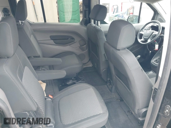 2021 Ford Transit Connect XLT with VIN NM0GS9F27M1500434, listed as a IAAI auction lot 39234991 with 25,883 mi miles and . Bid and sale history available at DreamBid. Image 8.