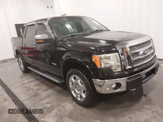 2011 Ford F-150 XLT with VIN 1FTFW1ET3BFC27328, listed as a IAAI auction lot 41557103 with 117,966 mi miles. Bid and sale history available at carsss.com. Image 1.