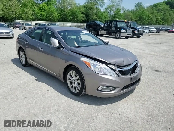 2013 Hyundai Azera z VIN KMHFG4JG4DA240690, wystawiony jako Copart lot #57465565 z przebiegiem 164 757 mil mil oraz Szkoda całkowita • Salvage title. Historia ofert i sprzedaży dostępna na DreamBid. Obrazek 13.
