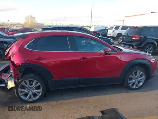 2022 Mazda CX-30 S Carbon Edition с VIN 3MVDMBCL4NM431242, выставлен на аукционе IAAI как лот 41851636 с пробегом 40 982 миль миль и . История ставок и продаж доступна на DreamBid. Изображение 13.