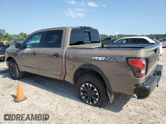 2021 Nissan Titan Pro-4X с VIN 1N6AA1ED2MN533749, выставлен на аукционе Copart как лот 54659655 с пробегом Не указан миль и Списание • Salvage title. История ставок и продаж доступна на DreamBid. Изображение 2.