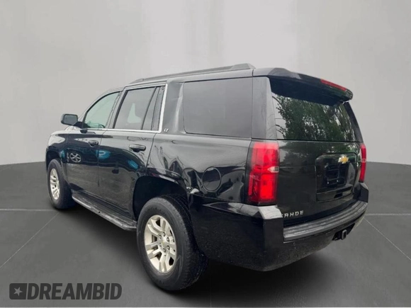 2015 Chevrolet Tahoe LT with VIN 1GNSKBKC4FR56770, listed as a Copart auction lot 64114815 with 203,448 mi miles and Clean title. Bid and sale history available at DreamBid. Image 3.