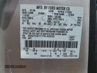 2007 Mercury Mariner Luxury z VIN 4M2YU91117KJ02032, wystawiony jako Copart lot #50418815 z przebiegiem 128 498 mil mil oraz Szkoda całkowita • Salvage title. Historia ofert i sprzedaży dostępna na DreamBid. Obrazek 13.