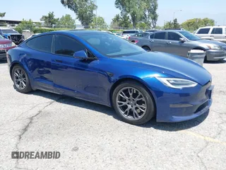 2021 Tesla Model S Long Range z VIN 5YJSA1E57MF428333, wystawiony jako IAAI lot #42545180 z przebiegiem 50 420 mil mil oraz . Historia ofert i sprzedaży dostępna na DreamBid. Obrazek 1.