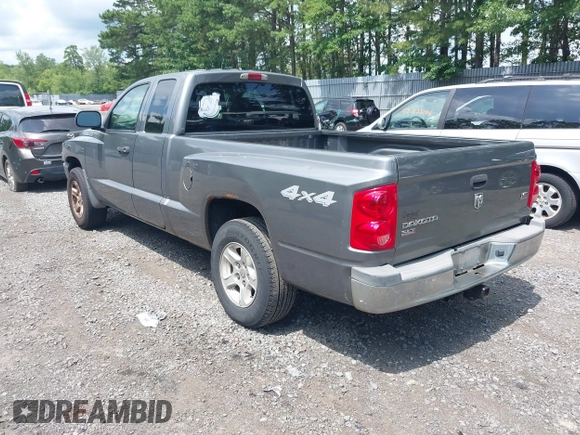 2005 Dodge Dakota SLT with VIN 1D7HW42N25S155393, listed as a IAAI auction lot 42727690 with 230,042 mi miles and . Bid and sale history available at DreamBid. Image 3.