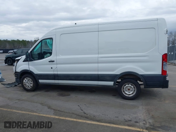 2021 Ford Transit Cargo with VIN 1FTBR1C85MKA12810, listed as a IAAI auction lot 41610132 with 105,724 mi miles and . Bid and sale history available at DreamBid. Image 14.