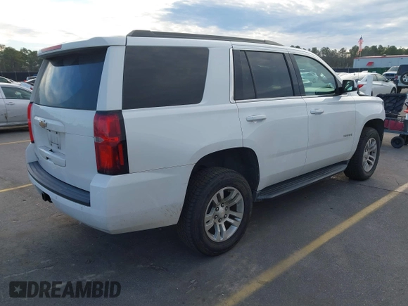 2020 Chevrolet Tahoe LS with VIN 1GNSCAKC6LR197289, listed as a IAAI auction lot 41429866 with 127,071 mi miles and . Bid and sale history available at DreamBid. Image 4.
