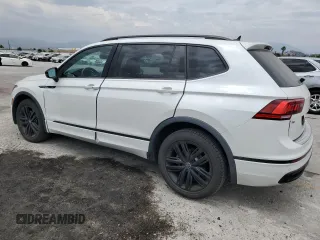 2022 Volkswagen Tiguan SE R-Line Black with VIN 3VVCB7AXXNM109437, listed as a Copart auction lot 59607495 with 30,985 mi miles and Salvage title. Bid and sale history available at DreamBid. Image 2.