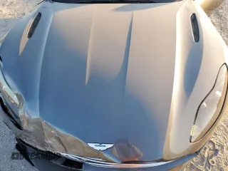 2019 Aston Martin DB11 z VIN SCFRMFCWXKGM06894, wystawiony jako Copart lot #41602955 z przebiegiem Nie podano mil oraz Szkoda całkowita • Salvage title. Historia ofert i sprzedaży dostępna na DreamBid. Obrazek 12.